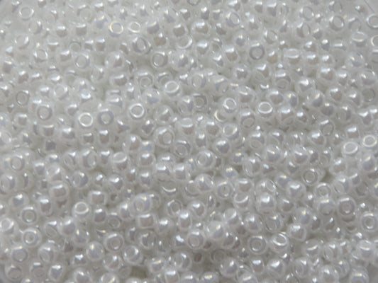 Shiny white seed beads, 2mm in size, round shape.