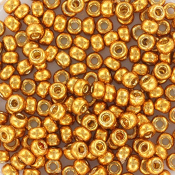 Yellow gold colored seed beads, 3mm in size, round shape.