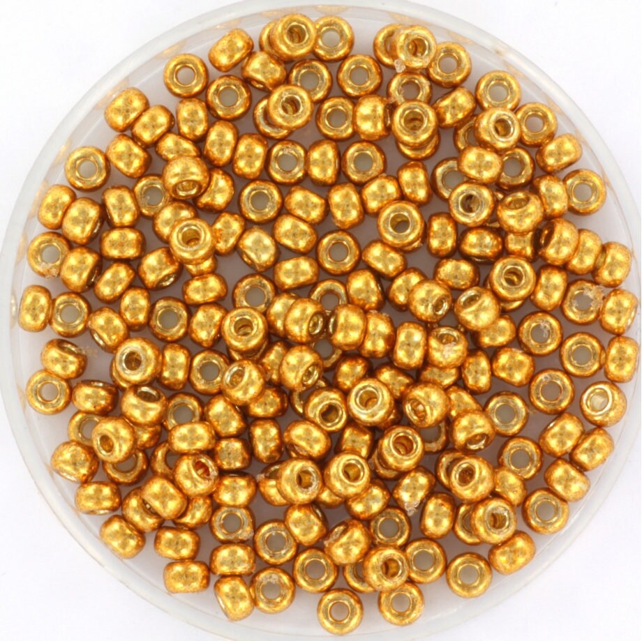 Yellow gold colored seed beads, 3mm in size, round shape.