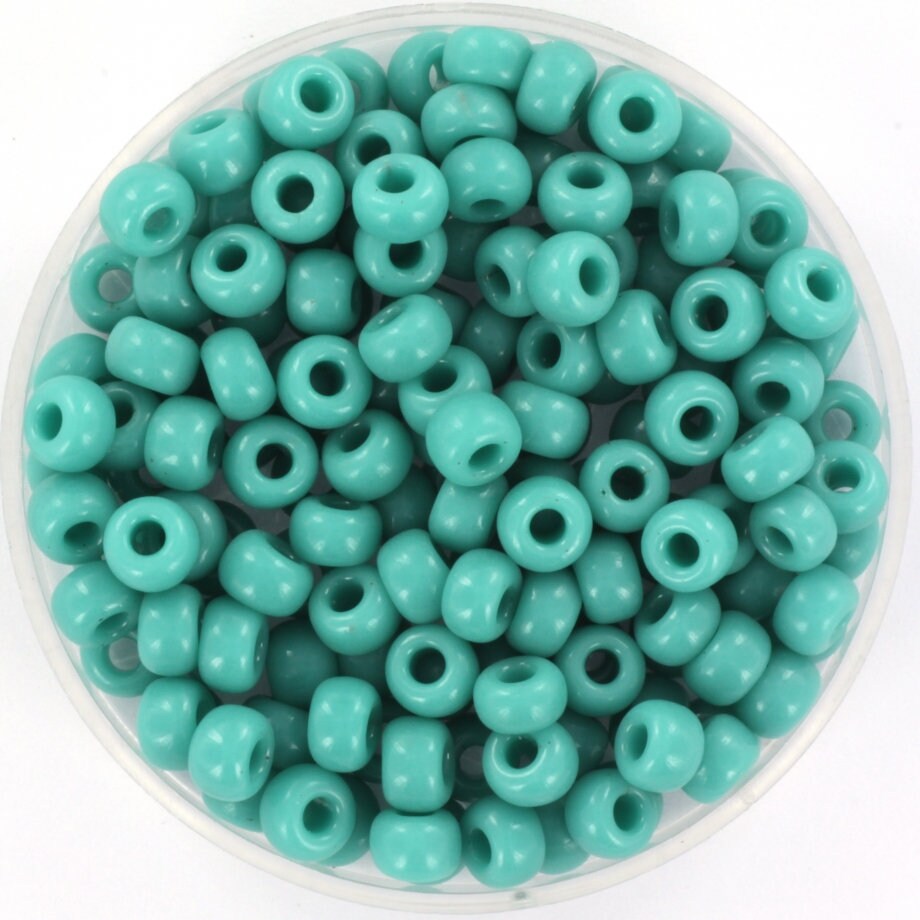 Opaque turquoise green seed beads, 4mm in size and round in shape.