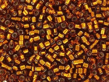 Miyuki Delica beads silverlined dark topaz, 5g 11/0 DB144, cylindrical beads, size 1.6mm, transparent brown Miyuki, color DB 144, amber