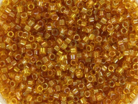 Miyuki Delica beads fancy lined marigold, 5g 11/0 DB2372, cylindrical beads, transparent orange Miyuki, color DB 2372, light brown