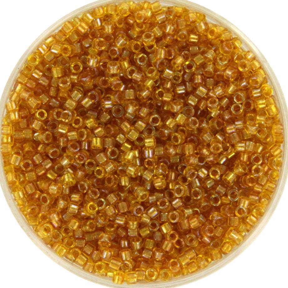 Miyuki Delica beads fancy lined marigold, 5g 11/0 DB2372, cylindrical beads, transparent orange Miyuki, color DB 2372, light brown